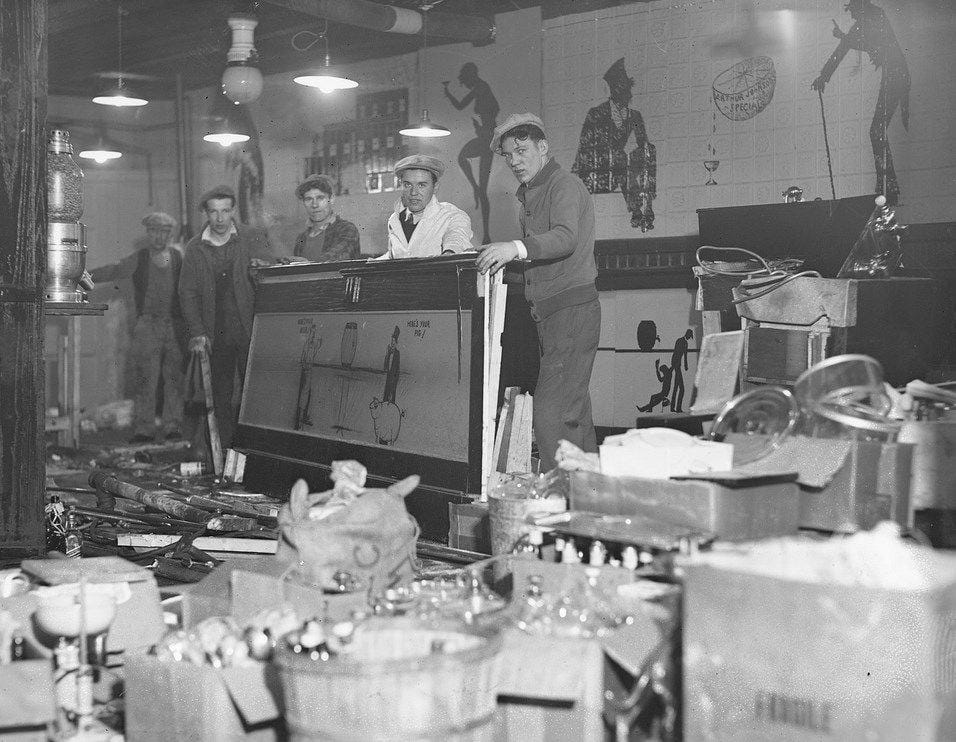 A live band provides upbeat jazz music, the intoxicating soundtrack to a night of illicit fun in a bustling Prohibition-era speakeasy. A live band provides upbeat jazz music, the intoxicating soundtrack to a night of illicit fun in a bustling Prohibition-era speakeasy.