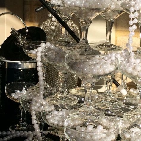 PEARL CHAMPAGNE TOWER FOR PEARLS AND PROSECCO BRIDAL SHOWER THEME