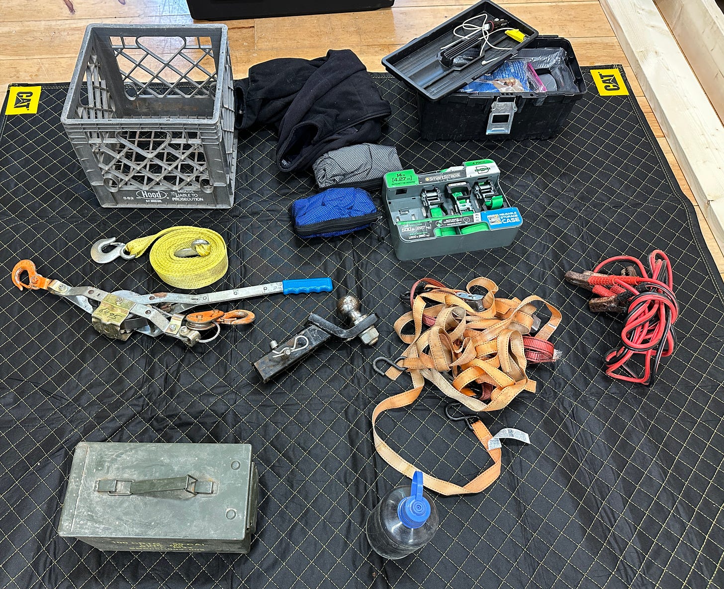 Contents of the emergency bin laid out on a blanket. Contents of the emergency bin laid out on a blanket.