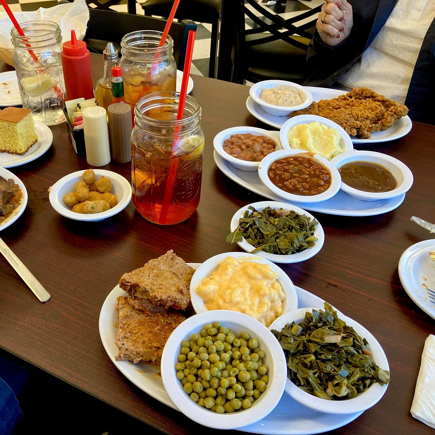 May be an image of 1 person and collard greens