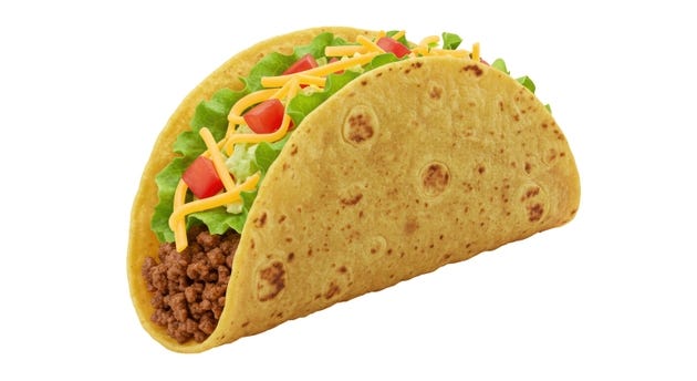 Isolated Delicious Taco with Meat Cheese and Vegetables Isolated Delicious Taco with Meat Cheese and Vegetables