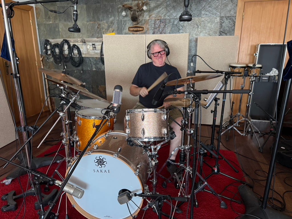 Man recording playing drums Man recording playing drums