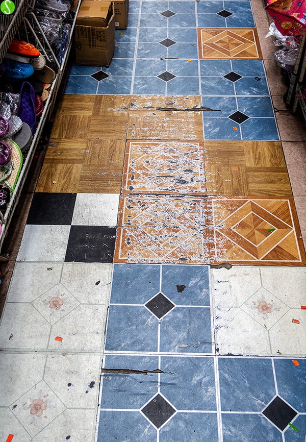 Steve Butcher photo of patchwork tilework in store on LES 2017