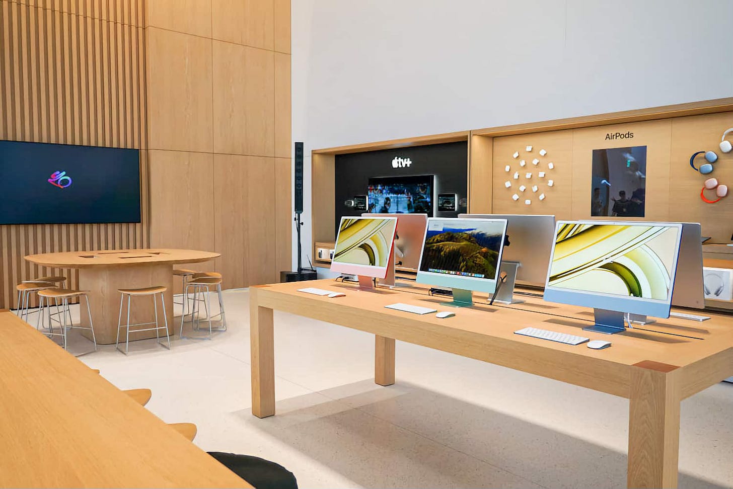 The interior of Apple Hongdae. Avenues line one wall and a Today at Apple table is stationed near another. The interior of Apple Hongdae. Avenues line one wall and a Today at Apple table is stationed near another.