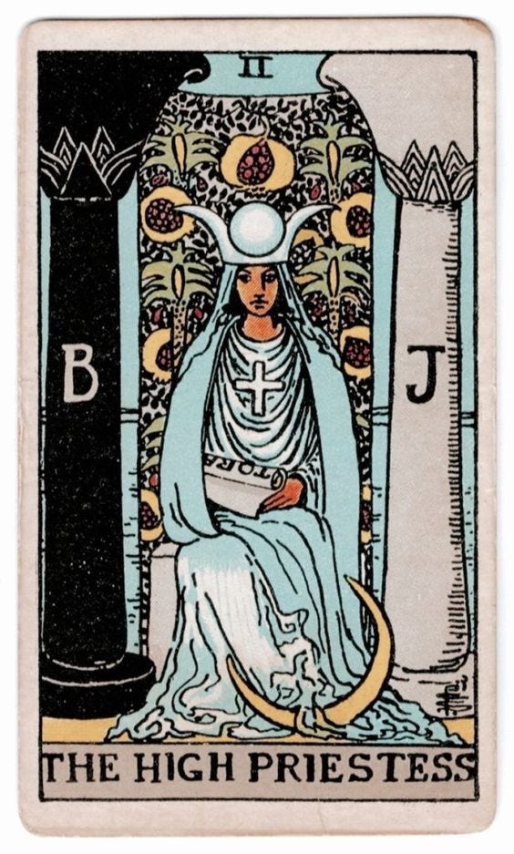 This may contain: the high priestess tarot card