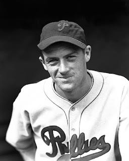 A person in a baseball uniform

AI-generated content may be incorrect.