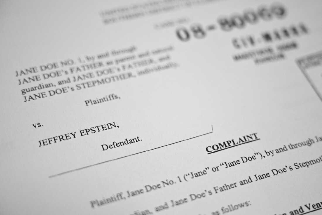 DOJ releases additional Epstein files as it removes others : NPR