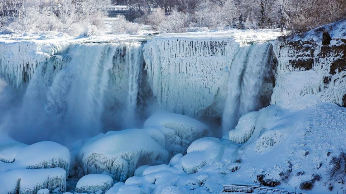  An 'ice bridge' at the bottom of the falls forms when ice chunks pop up and out of the pool, creating a glacier 80-100 feet thick. 