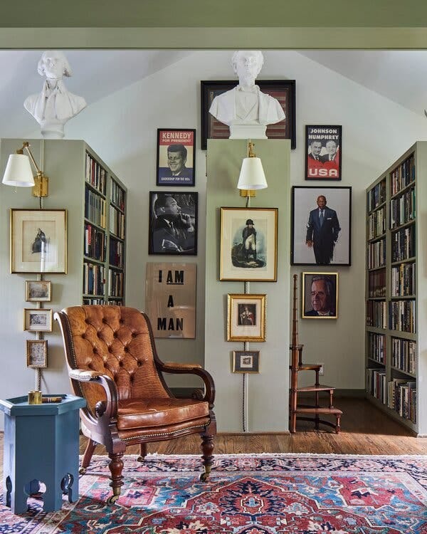 One library is equipped with a traditional wood-and-leather armchair.