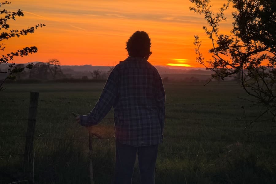 My daughter looks out on the sunset. My daughter looks out on the sunset.