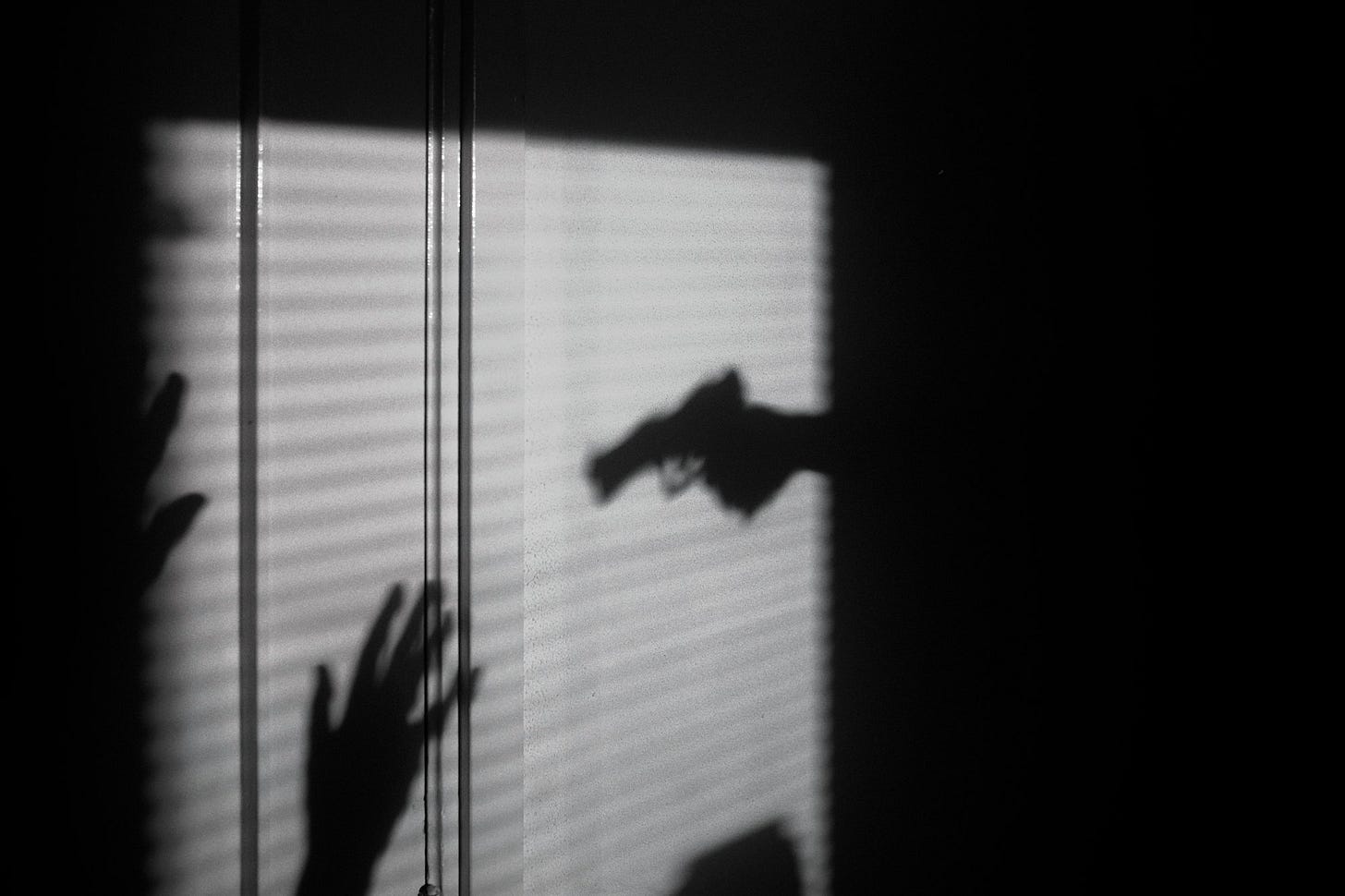 silhouette of person on window silhouette of person on window