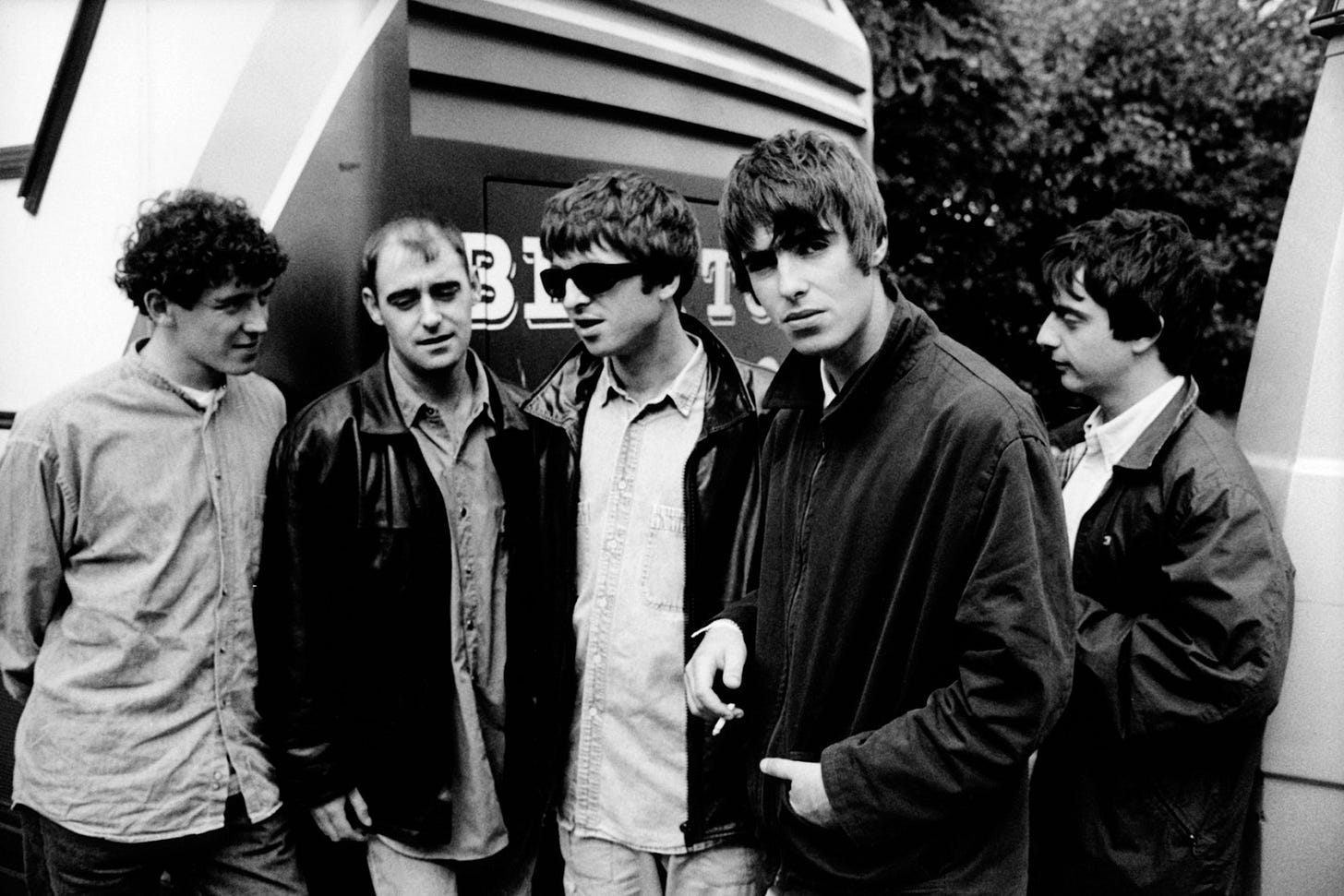 Tony McCarroll, Paul Arthurs, Noel Gallagher, Liam Gallagher, Paul McGuigan