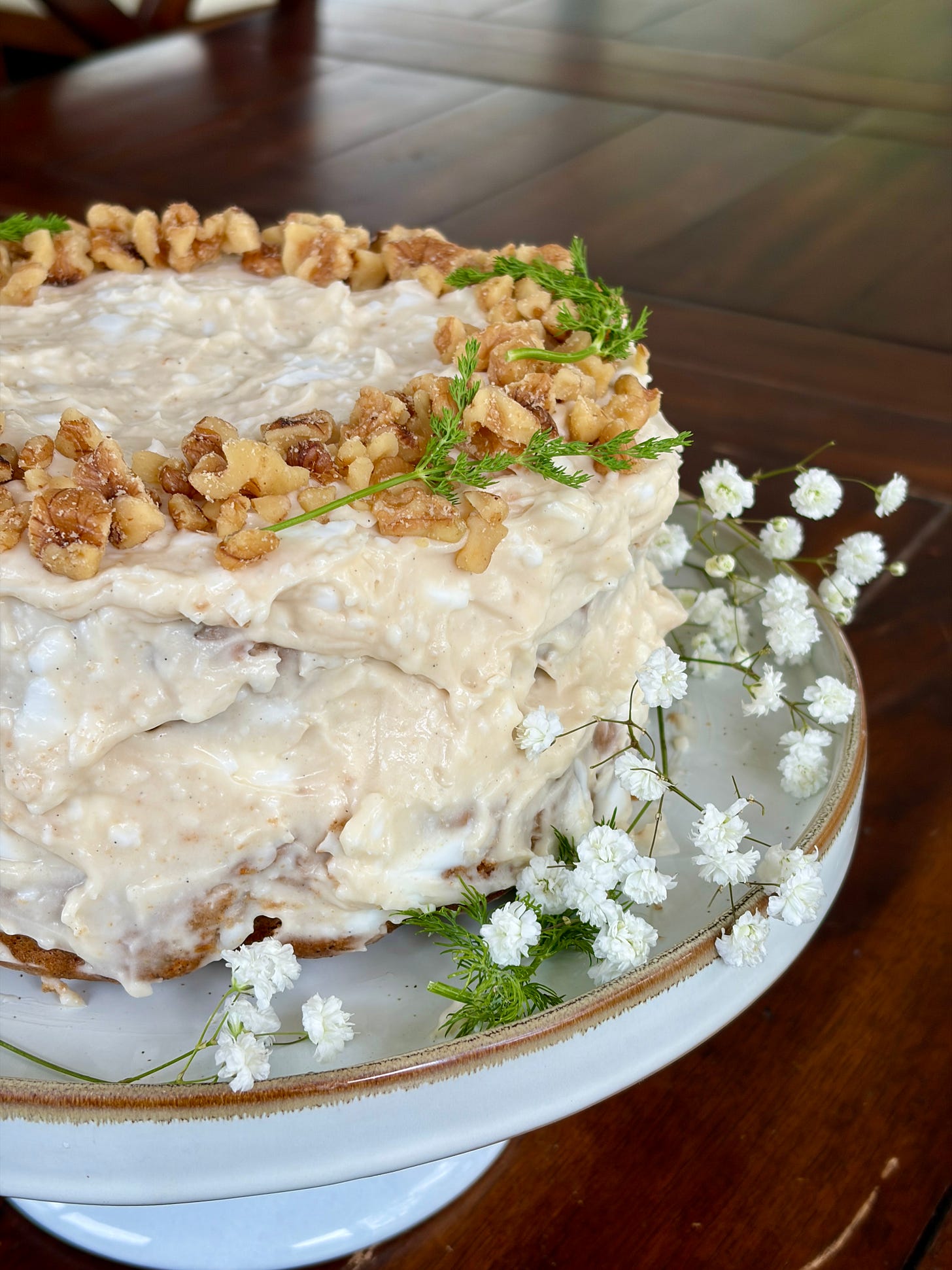 Gluten-free, dairy-free carrot cake with honey walnut cream cheese frosting