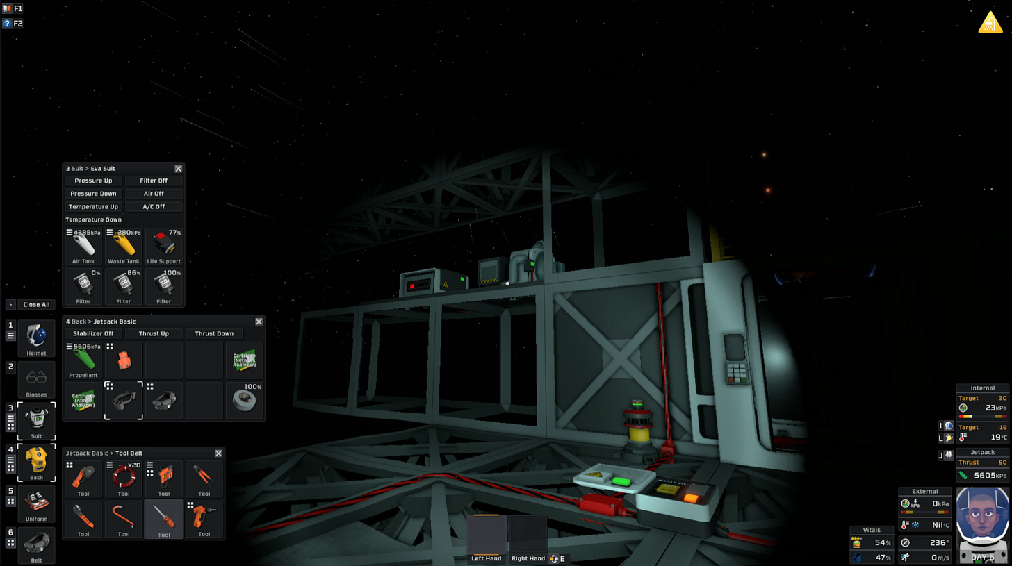 Stationeer placing a station battery on lower deck of platform structure.