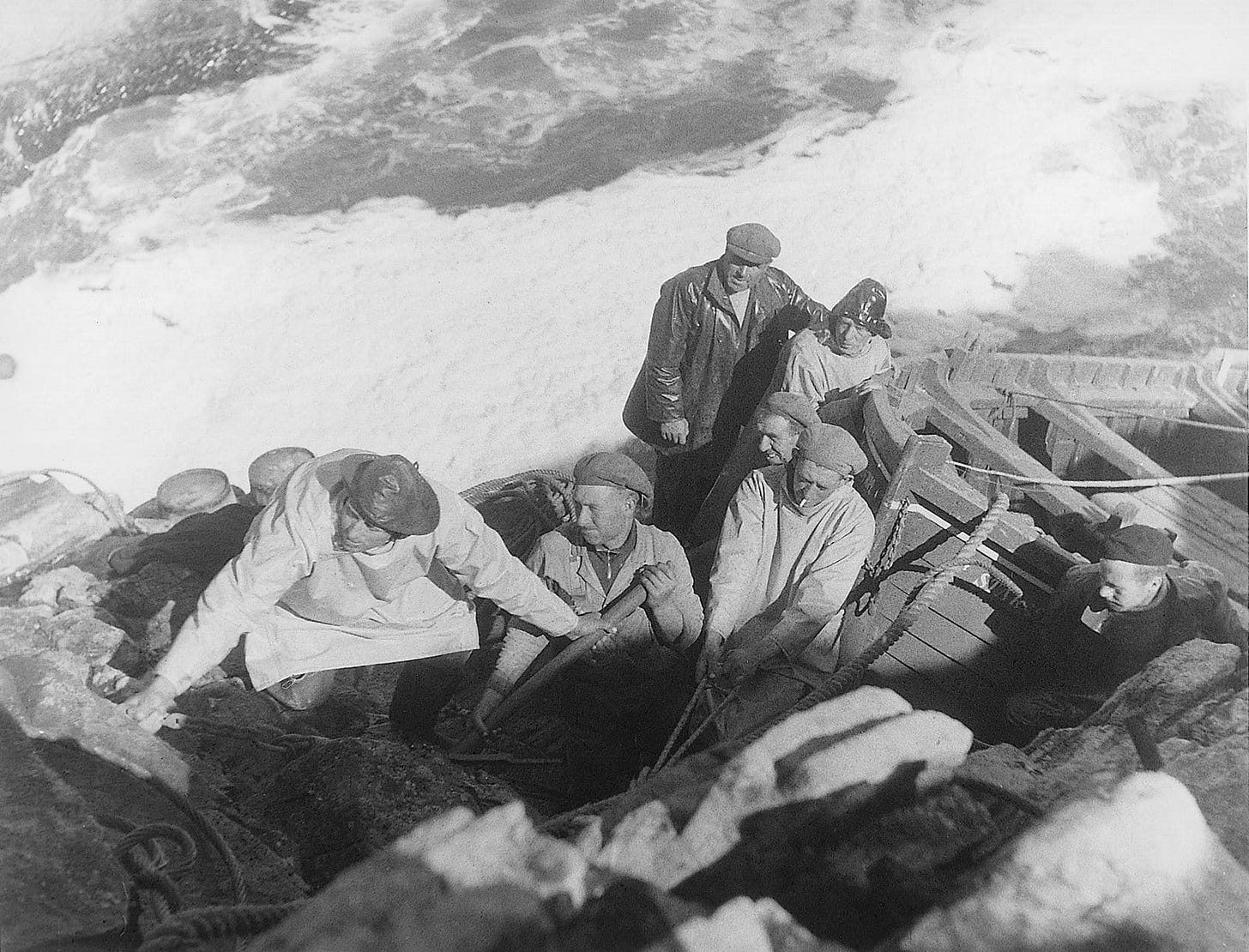 Hauling the boat up the cliff, Sùlaisgeir. Photo by James McGeoch. Hauling the boat up the cliff, Sùlaisgeir. Photo by James McGeoch.