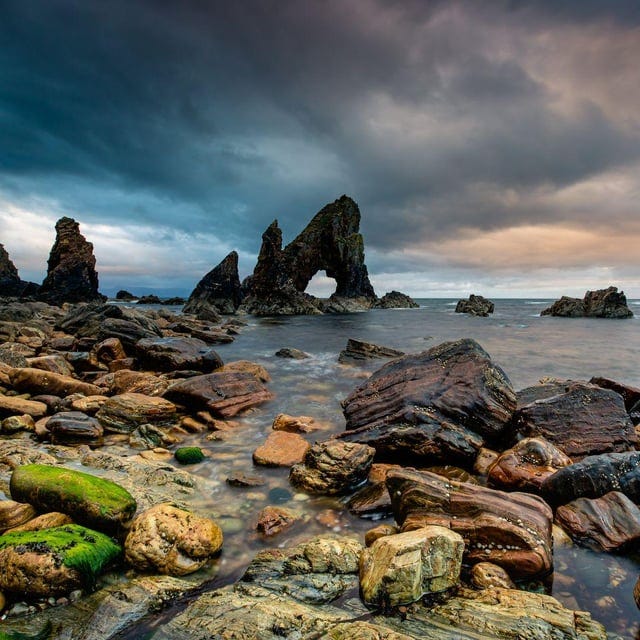 r/LoveIreland - 🌅 Captivating sunset at Crohy Arch, Crohy Head, County Donegal, Ireland