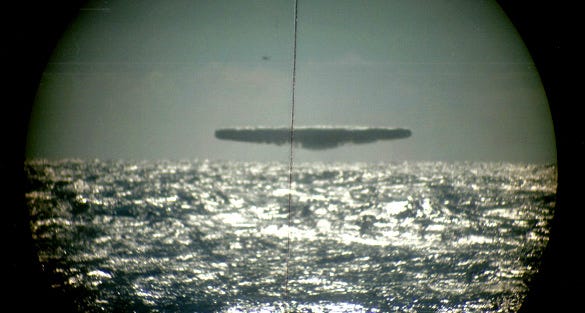 These are what Ufologists call "tic tac" UFO's and the Navy claimed they were about the size of a football field in scale.