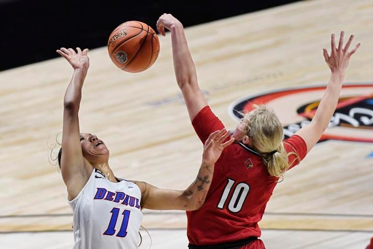 Van Lith helps No. 5 Louisville break school points record