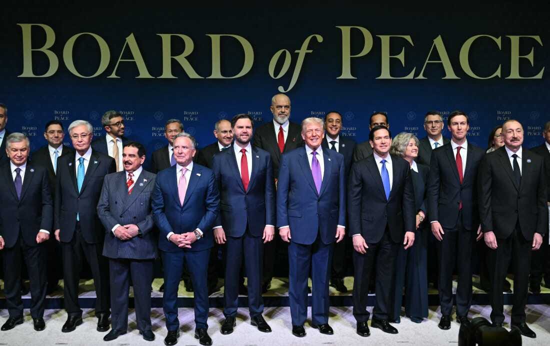 President Trump, flanked by Vice President JD Vance and Secretary of State Marco Rubio, joins leaders for a group photo during the inaugural meeting of the Board of Peace in Washington on Thursday. President Trump, flanked by Vice President JD Vance and Secretary of State Marco Rubio, joins leaders for a group photo during the inaugural meeting of the Board of Peace in Washington on Thursday.