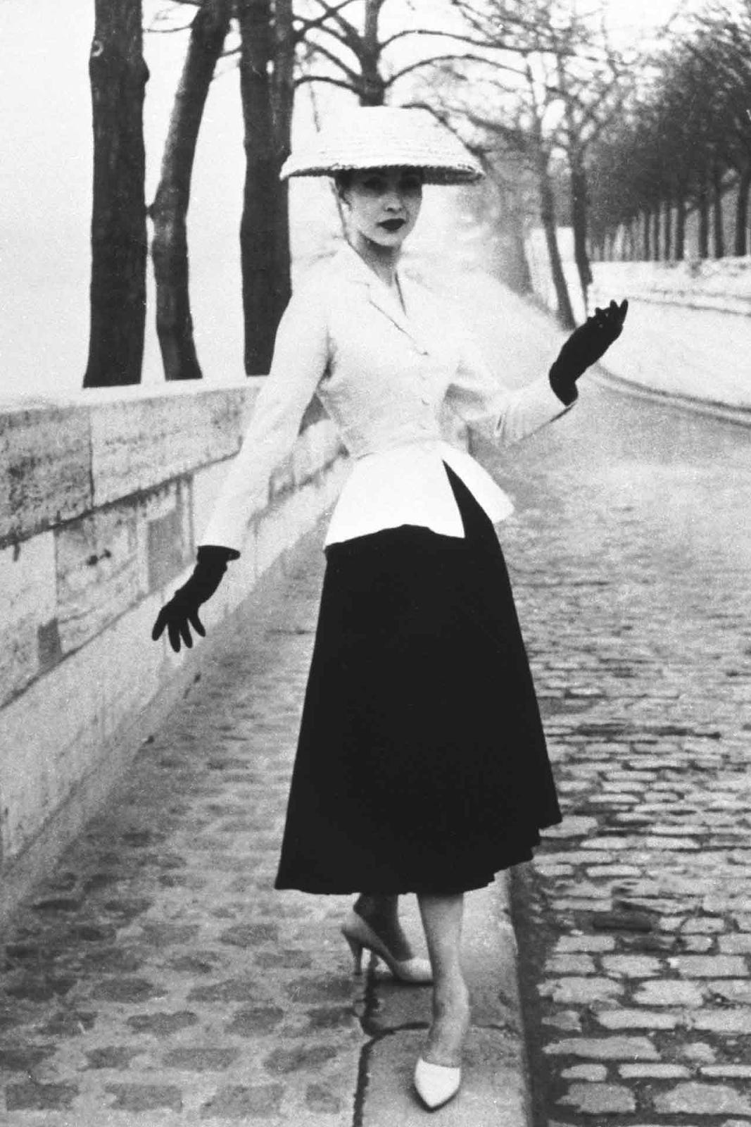 the sack dress was introduced by which designer in 1957 File:1957 Balenciaga chemise or sack dress, black boucl wool 02.jpg