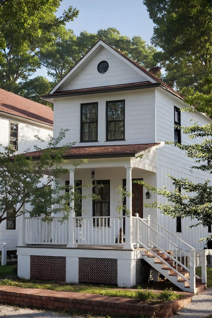 This may contain: a white house with black windows and stairs