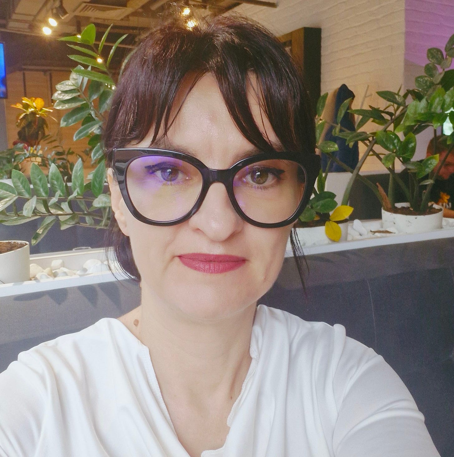 May be an image of one or more people, bangs and eyeglasses