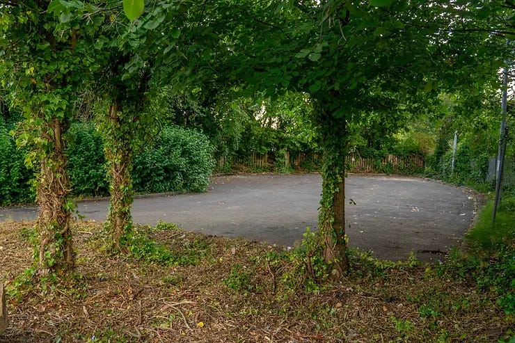 Inside of the carpark. Shrubbery has been cut back and litter cleared up.