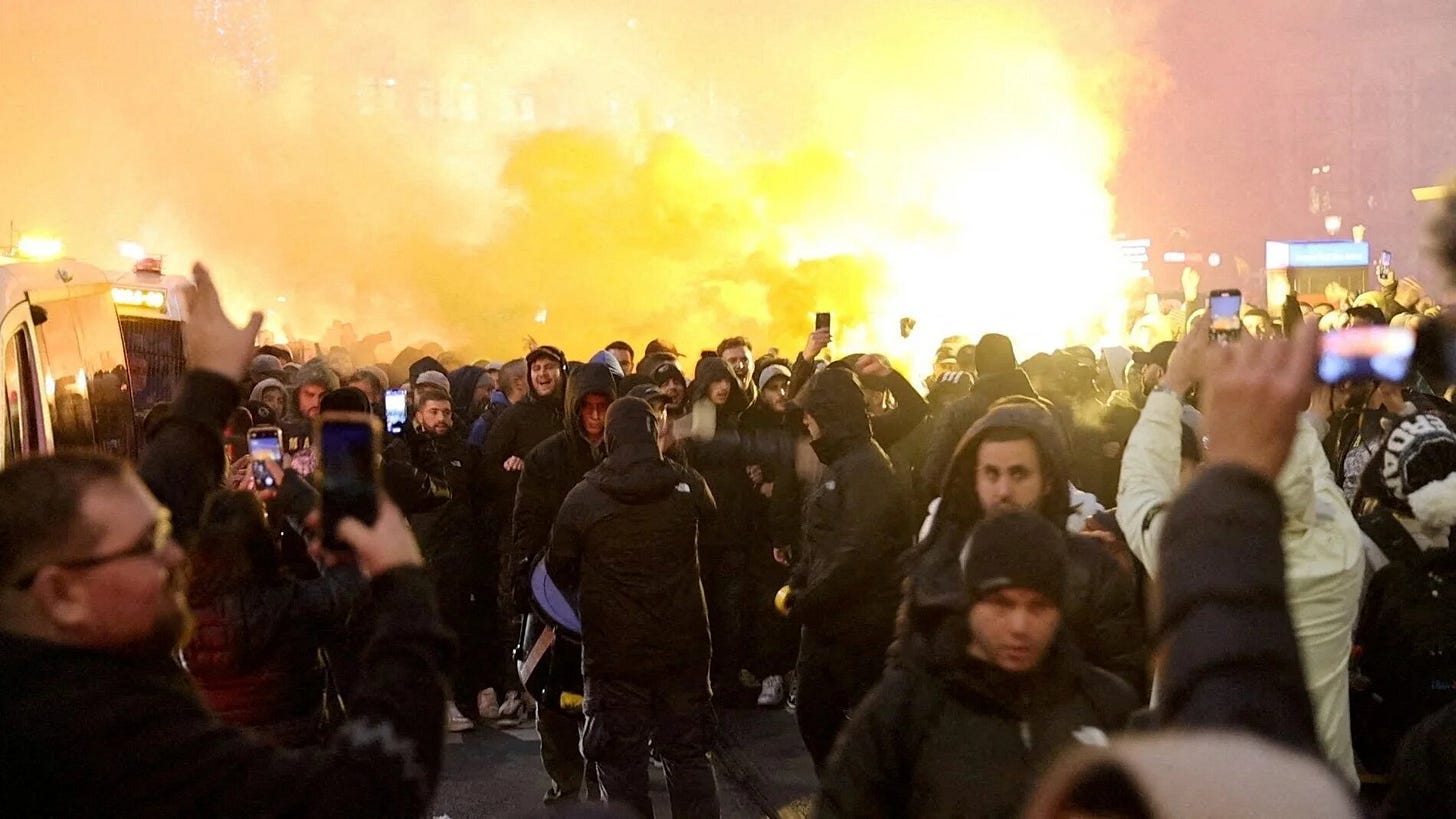 Maccabi Tel Aviv supporters demonstrate and light flares in Amsterdam, Netherlands, 7 November 2024, in this screengrab obtained from a social media video (Reuters)