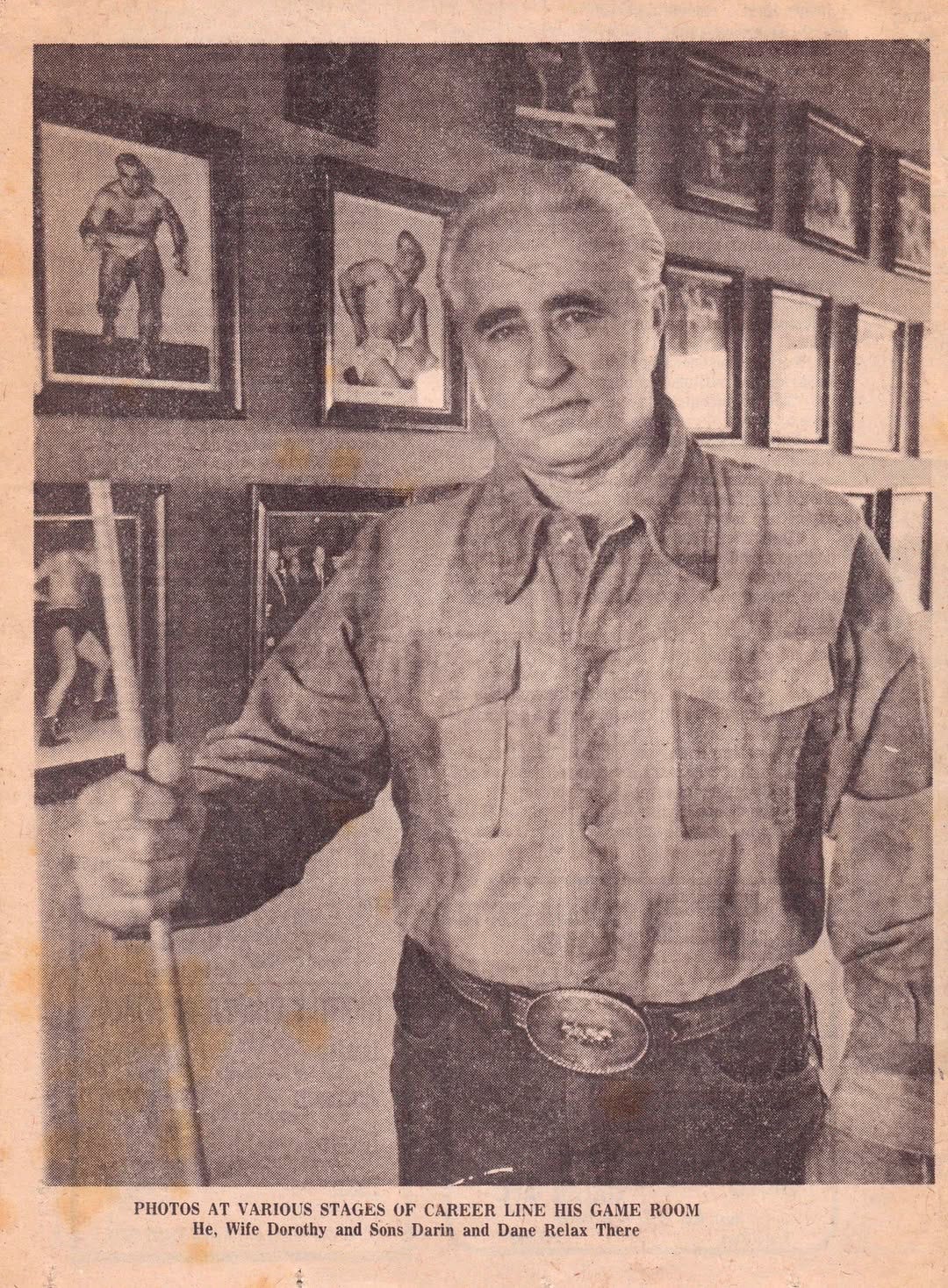 May be an illustration of 1 person and text that says 'PHOTOS AT VARIOUS STAGES OF CAREER LINE HIS GAME ROOM He, Wife Dorothy and Sons Darin and Dane Relax There' May be an illustration of 1 person and text that says 'PHOTOS AT VARIOUS STAGES OF CAREER LINE HIS GAME ROOM He, Wife Dorothy and Sons Darin and Dane Relax There'
