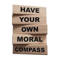 Have your own moral compass symbol. Business Concept words Have your own moral compass on wooden blocks.Copy space.Supports PNG files with transparent backgrounds.