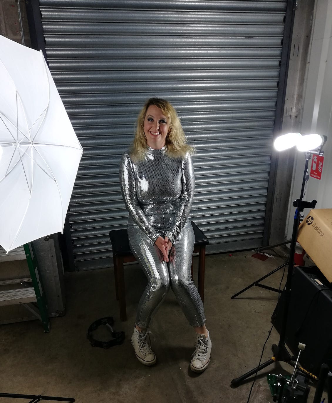Lucy wearing her glittery silver catsuit & a smile Lucy wearing her glittery silver catsuit & a smile