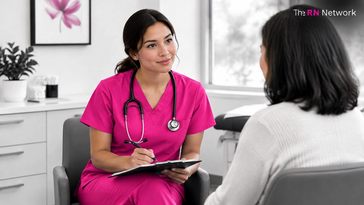 Nurse in pink scrubs speaking with a patient in an outpatient clinic