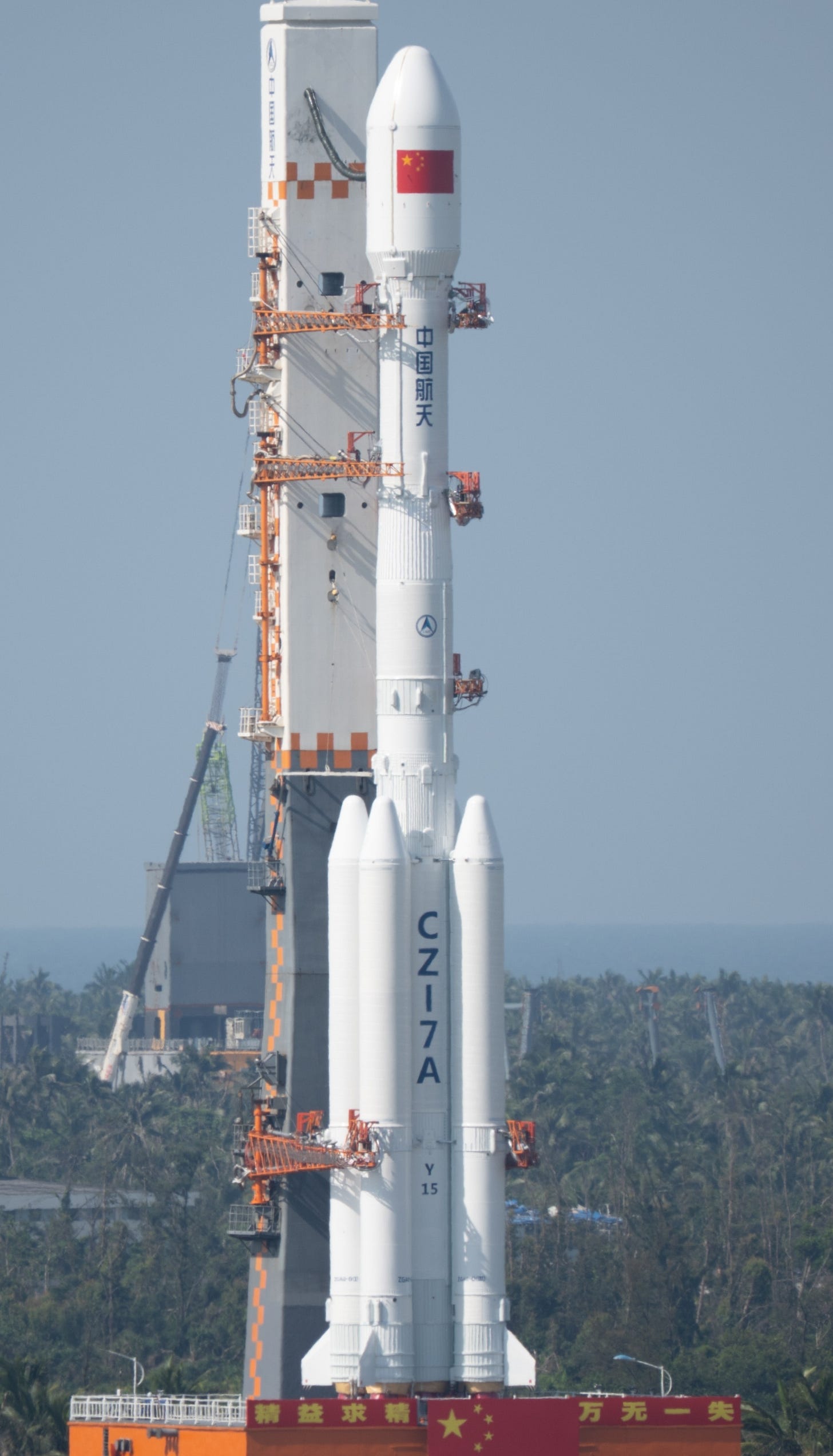 The Long March 7A Y15 vehicle during rollout at the Wenchang Space Launch Site. The Long March 7A Y15 vehicle during rollout at the Wenchang Space Launch Site.
