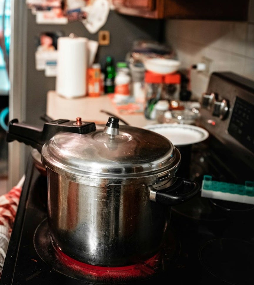 stainless steel cooking pot on stove stainless steel cooking pot on stove