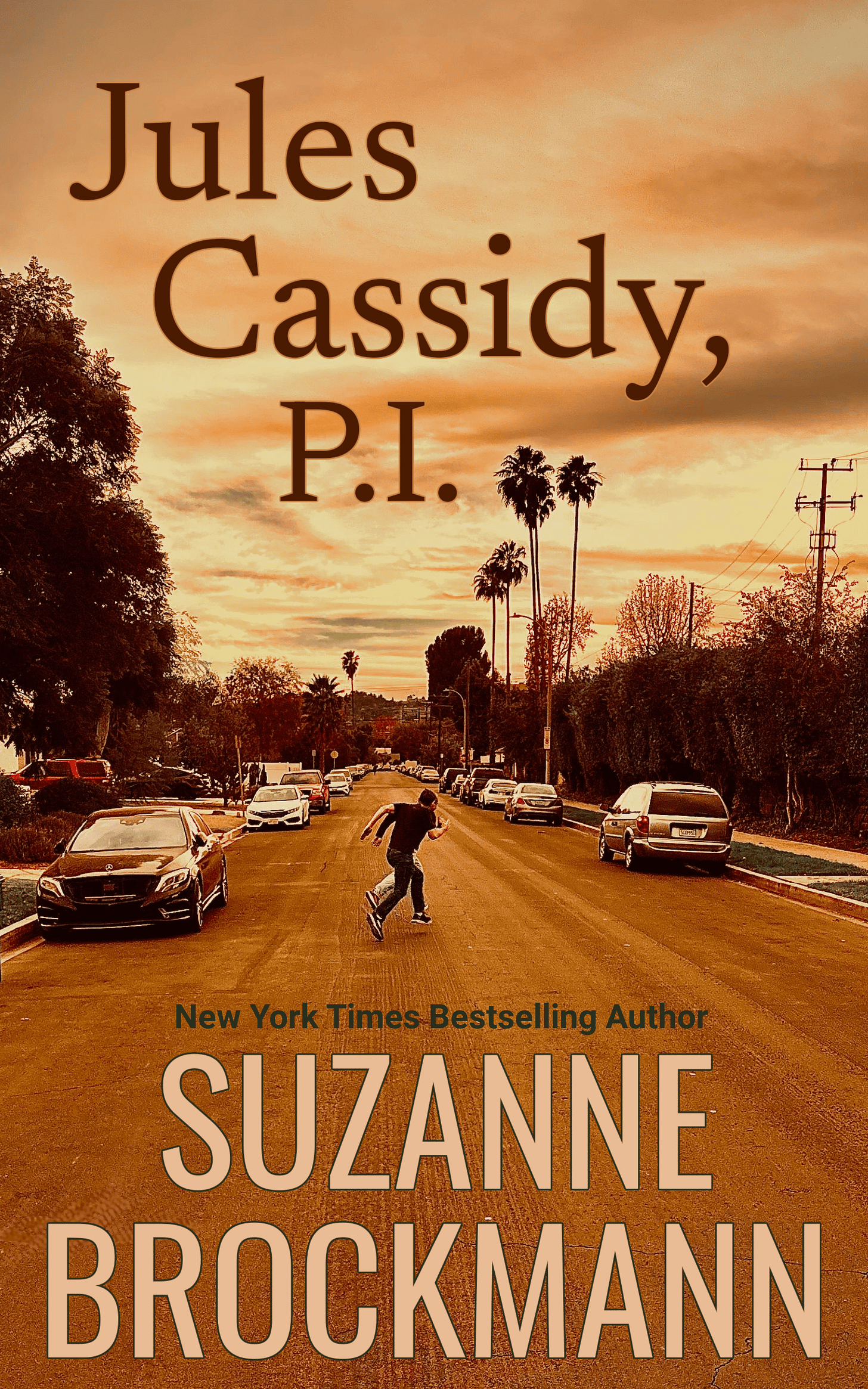 The cover art for Jules Cassidy, P.I. by Suzanne Brockmann shows a reddish-tinged evening sky and a road in a tired-looking Los Angeles Valley neighborhood where the small figures of two men, one large, one smaller, run across the street. Palm trees and electrical poles are silhouette against the sunset.