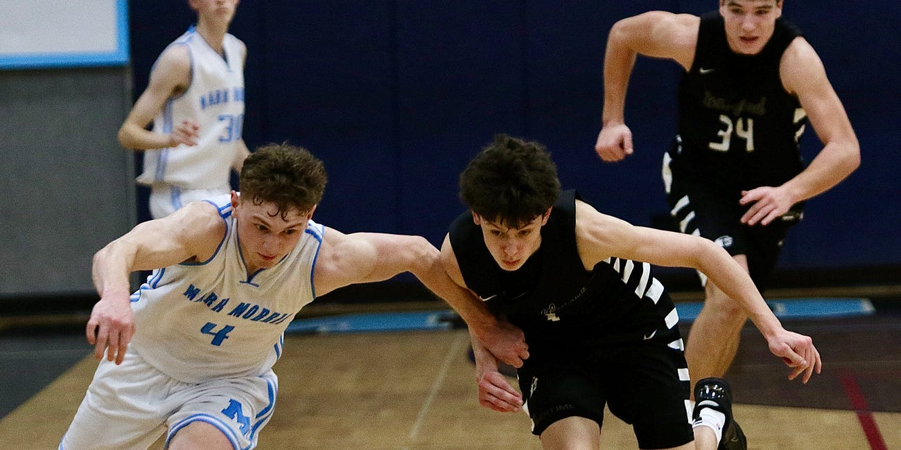 High School Boys Basketball: Woodland motors by Mark Morris in second half