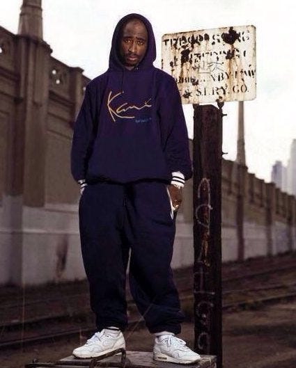 The godfather of streetwear talks Tupac, fashion today, and the future of Karl  Kani