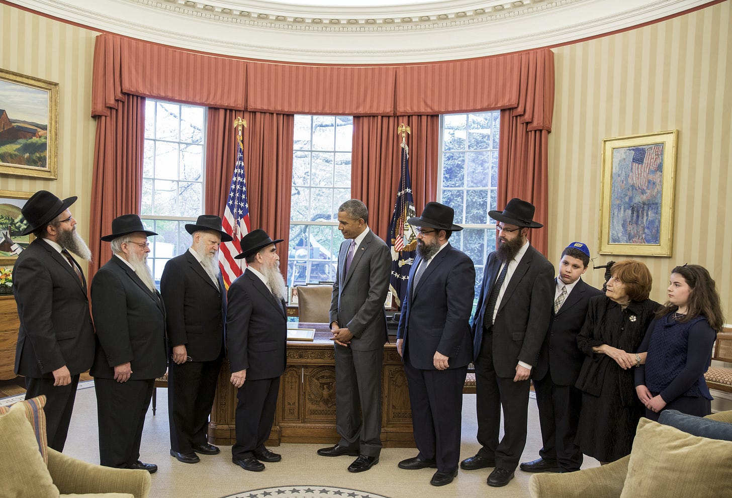 President Obama presents a ceremonial copy of the Education and Sharing Day Proclamation to a delegation from the American Friends of Lubavitch President Obama presents a ceremonial copy of the Education and Sharing Day Proclamation to a delegation from the American Friends of Lubavitch