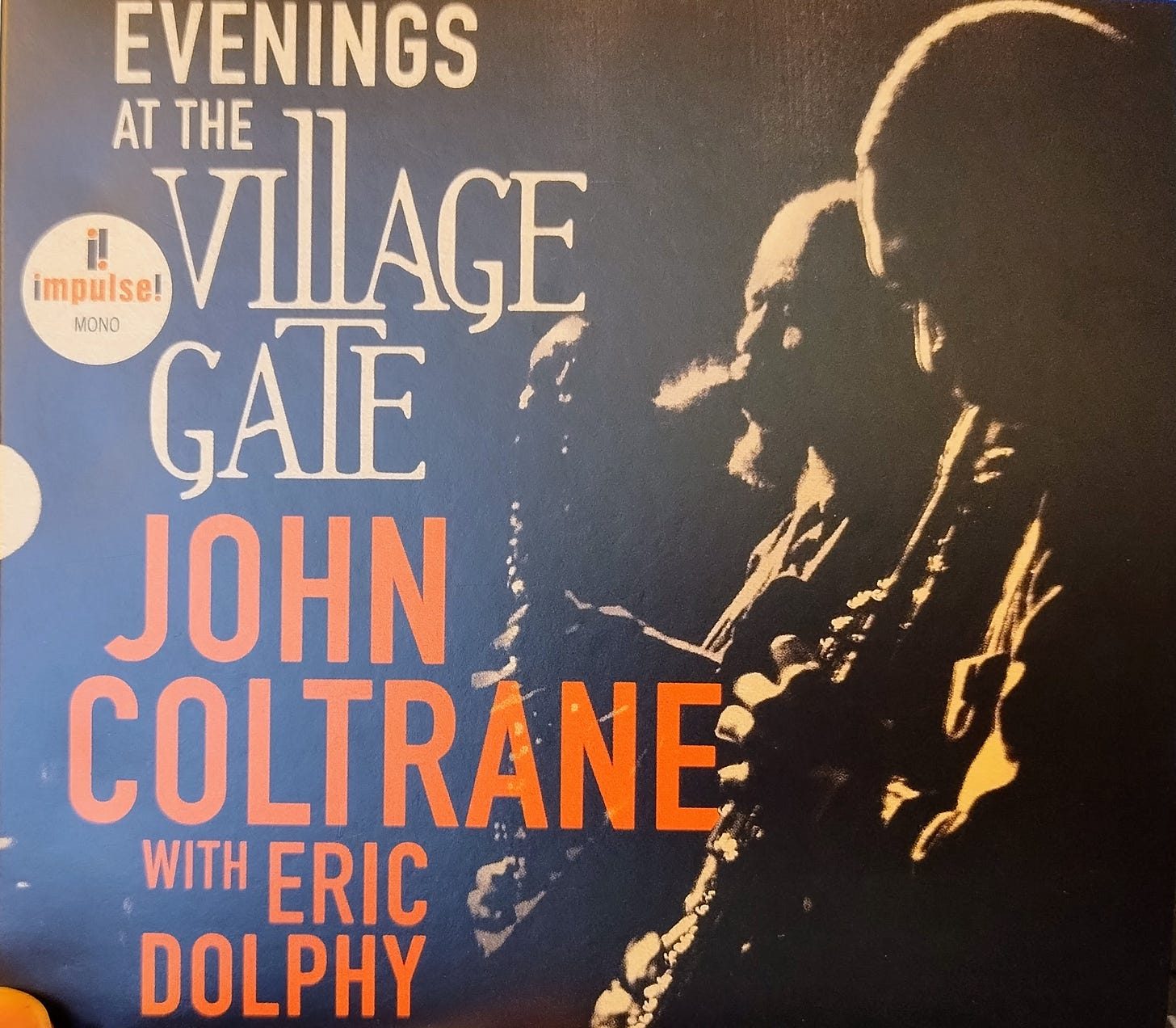 Evenings at the Village Gate, John Coltrane with Eric Dolphy CD album cover, showing black-and-white photo of John Coltrane playing soprano saxophone and Eric Dolphy playing bass clarinet