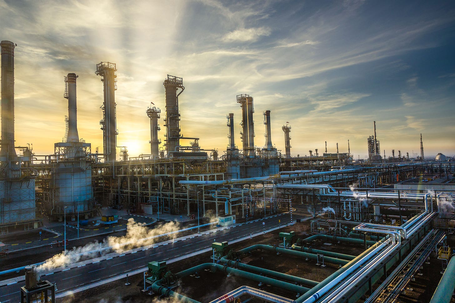 The sun shines over an oil refinery in the UAE The sun shines over an oil refinery in the UAE