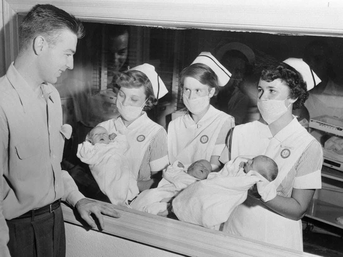 A group of nurses holding babies

AI-generated content may be incorrect.