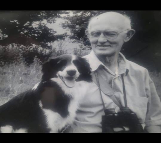 A person holding a dog

AI-generated content may be incorrect.