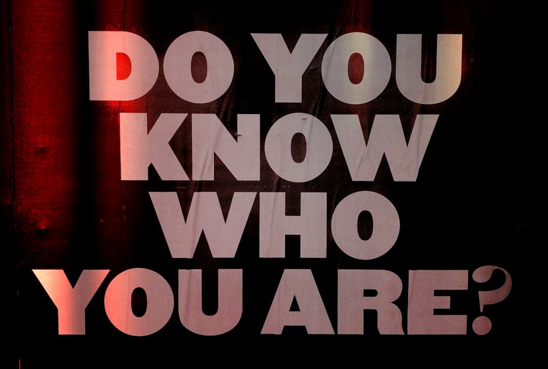 a black and white photo with the words do you know who you are?