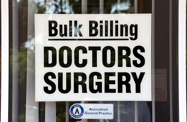 A sign advertising Bulk Billing on a window of a doctors surgery in Brisbane A sign advertising Bulk Billing on a window of a doctors surgery in Brisbane