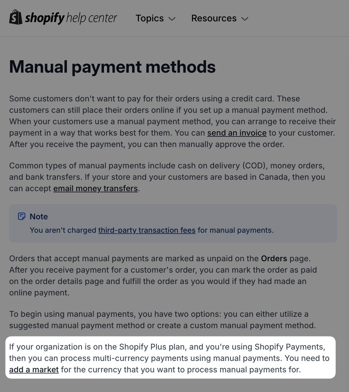 A screenshot from the Shopify Help Center page 'Manual payment methods,' explaining how to set up options like cash on delivery and bank transfers for non-credit card users. It highlights no transaction fees, the process of marking orders as paid, and options for suggested or custom methods. A note for Shopify Plus users mentions multi-currency support. The page has a white background with light gray content and blue/yellow highlights, featuring the Shopify logo and 'Topics'/'Resources' menus. A screenshot from the Shopify Help Center page 'Manual payment methods,' explaining how to set up options like cash on delivery and bank transfers for non-credit card users. It highlights no transaction fees, the process of marking orders as paid, and options for suggested or custom methods. A note for Shopify Plus users mentions multi-currency support. The page has a white background with light gray content and blue/yellow highlights, featuring the Shopify logo and 'Topics'/'Resources' menus.