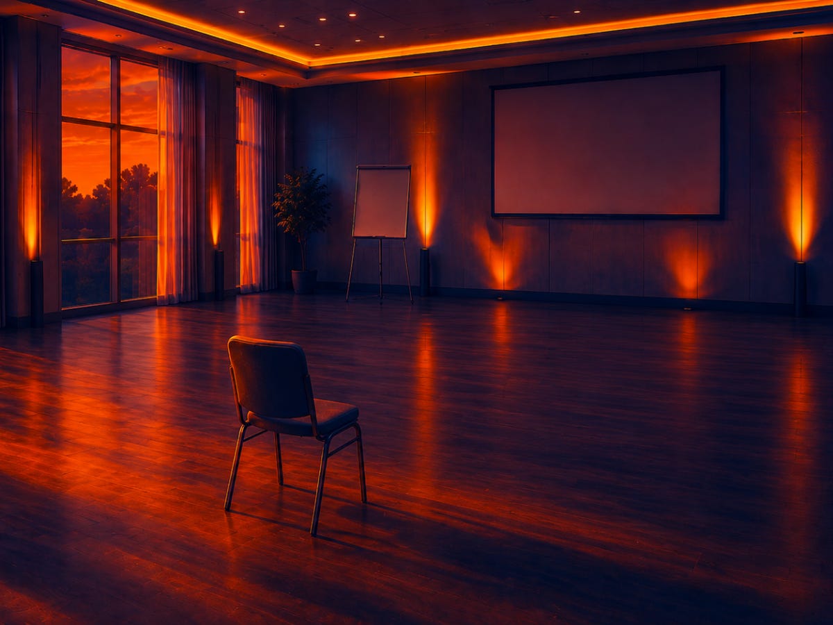 An empty conference room with just one chair An empty conference room with just one chair