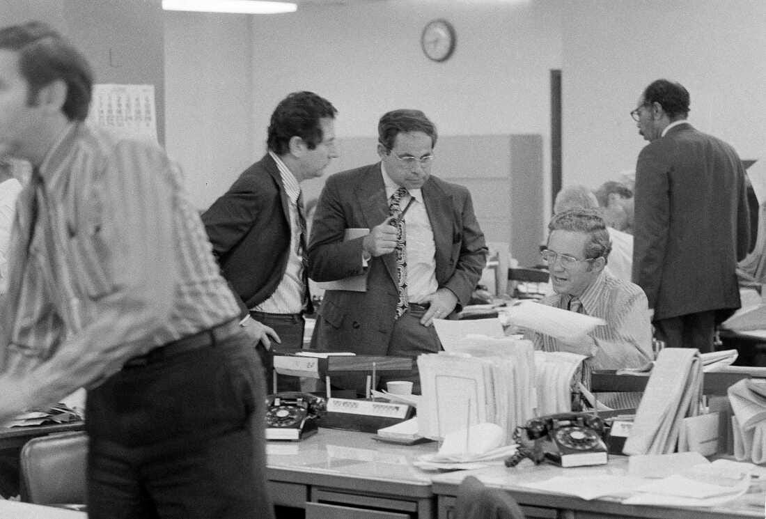 The city room of The New York Times is pictured on June 15, 1971. From left are Times editors James L. Greenfield, foreign editor; Max Frankel, chief Washington correspondent; and Fred P. Graham from the Times Washington bureau. Frankel went on to be the paper's top editor.