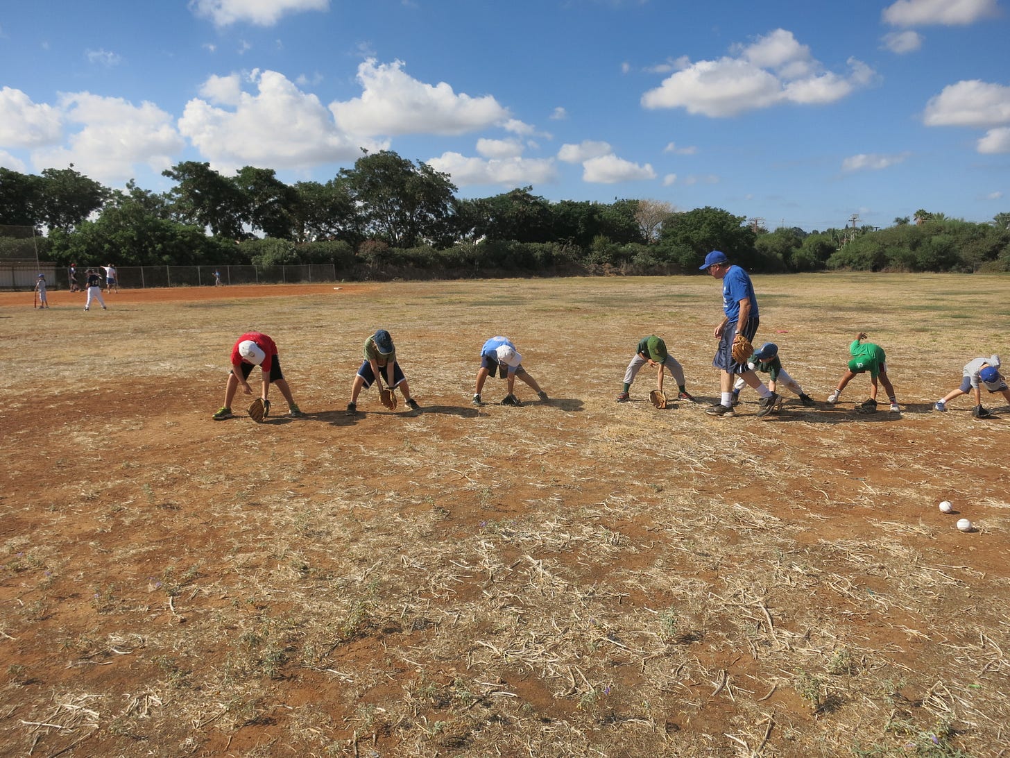 David Schenker, the Toughest Man in Jewish Baseball (http://archive.kingofjewishbaseball.com/2013/07/09/david/), teaches proper ground ball technique. 