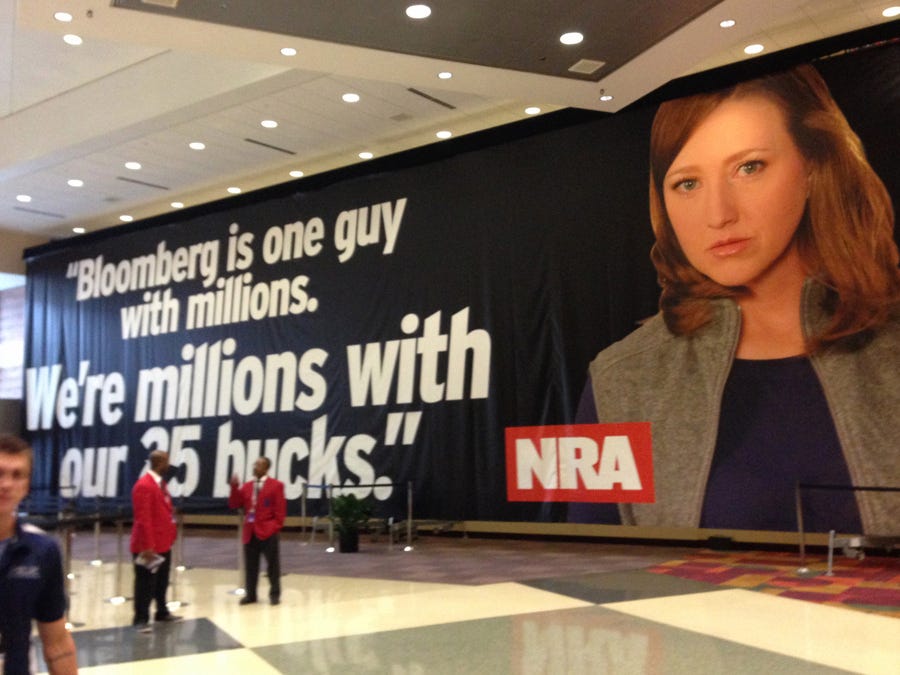 nra-gun-show-poster-bloomberg