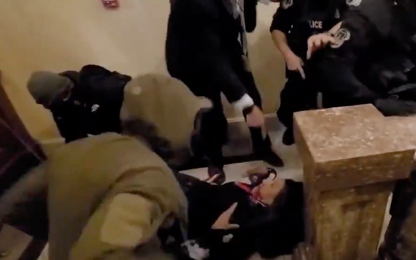 She was seen falling to the ground 